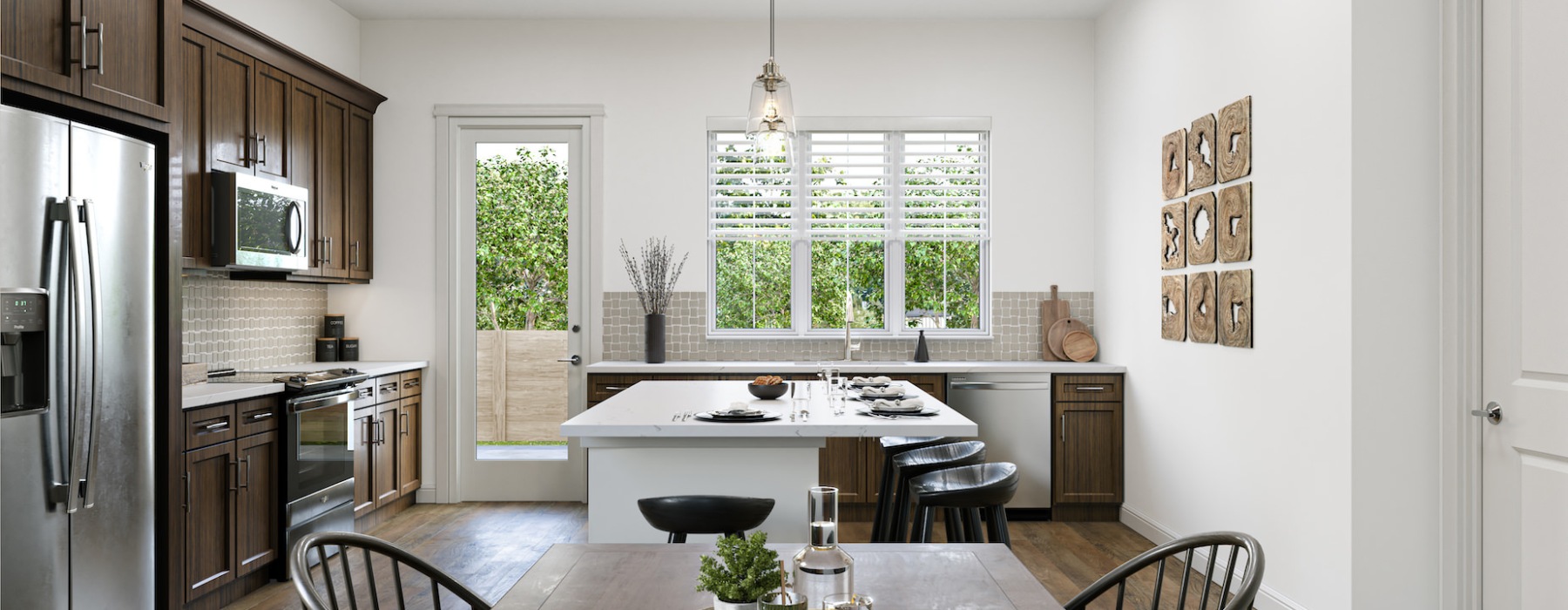 Mirella kitchen and dining area with a view of the backyard